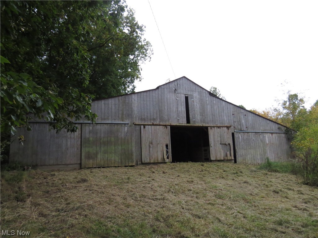 9797 Thwing Road Chardon, OH 44024 - Photo 32 of 35 62x32 horse barn in need of some repair