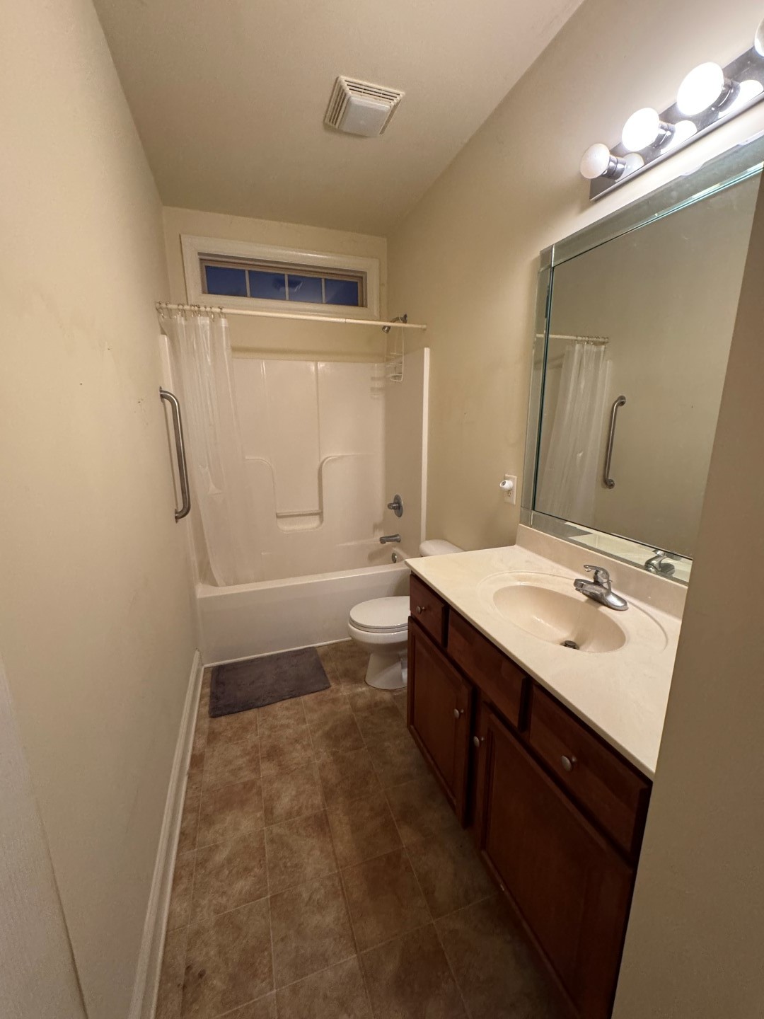 110 Westview Drive Spring Hill, TN 37174 - Photo 13 of 14 a bathroom with a sink a toilet a mirror and shower