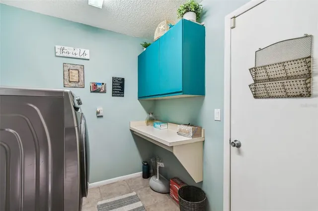 a view of a dining room with furniture wooden floor and chandelier