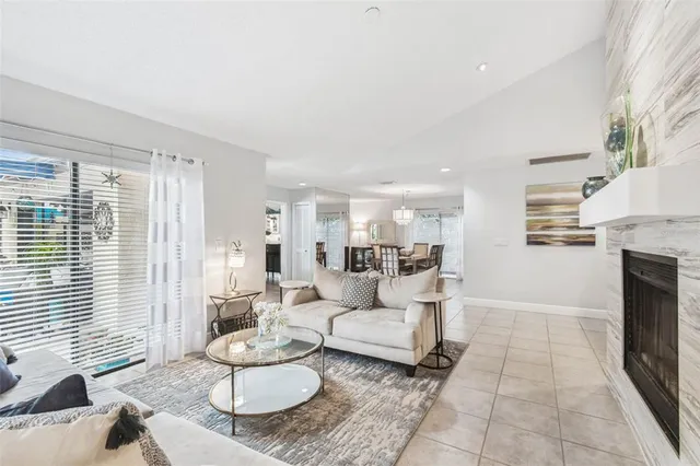 a bedroom with a large bed and a tv