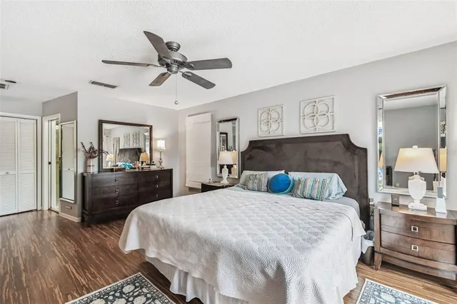 a bathroom with a sink vanity and a mirror