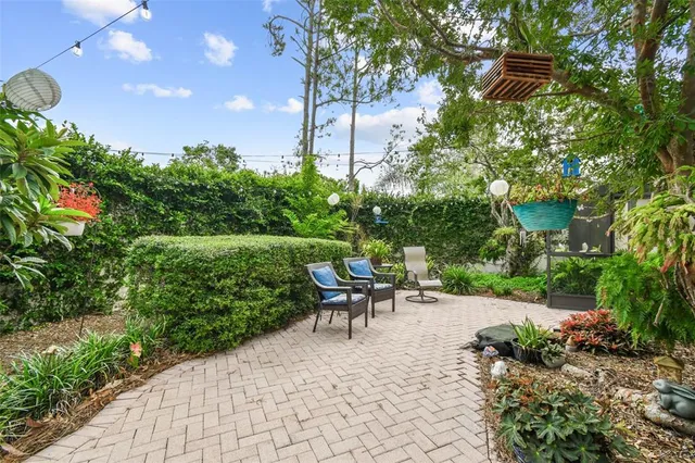 a outdoor dining space with furniture