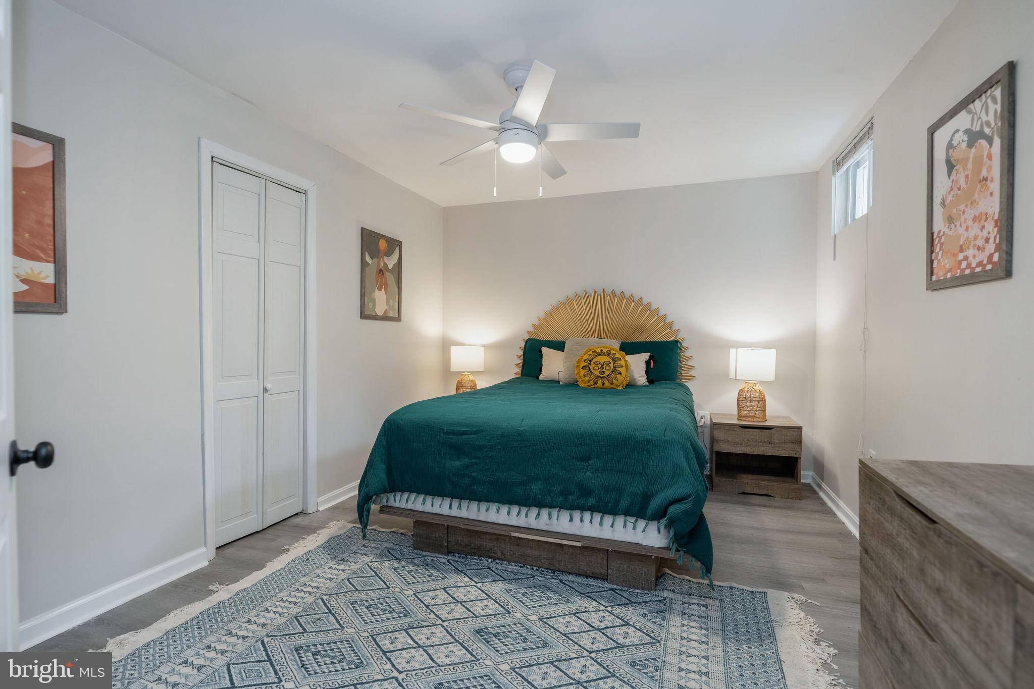 7603 Modisto Lane Springfield, VA 22153 - Photo 49 of 57 a bedroom with a bed and a window