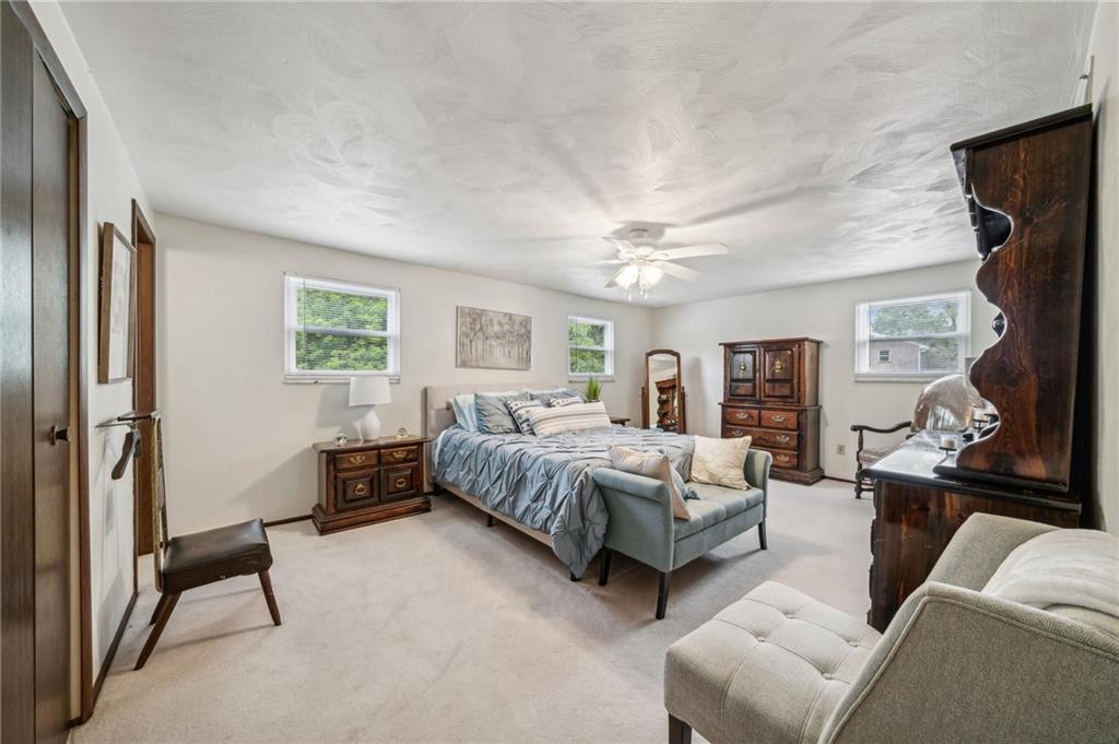 1021 Harvard Road Monroeville, PA 15146 - Photo 21 of 37 Large Primary Bedroom with 1/2 bath and a walk in closet