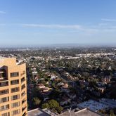 a view of a city with tall buildings