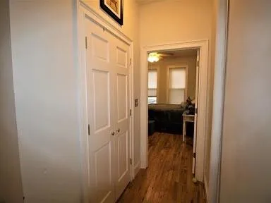 a view of a bedroom from a hallway