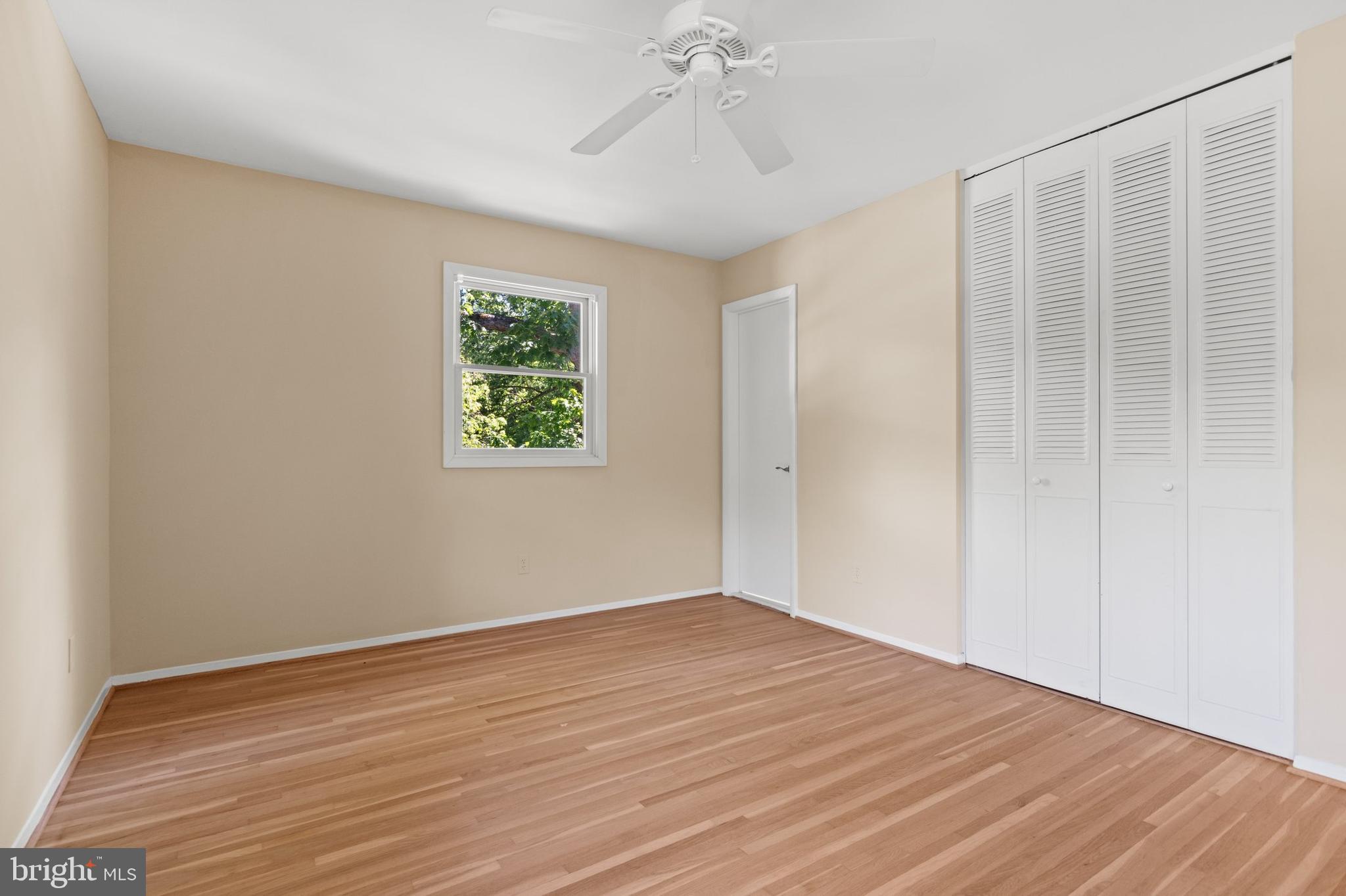6915 Hadlow Drive Springfield, VA 22152 - Photo 18 of 43 Primary BR closet doors & bathroom door