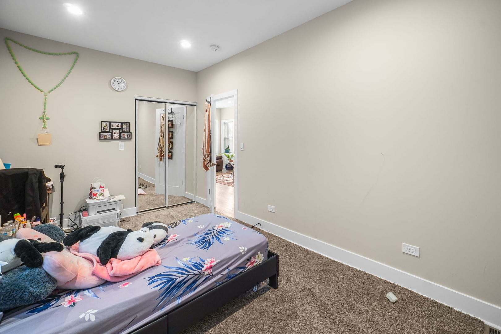 1906 South 60th Court Cicero, IL 60804 - Photo 11 of 40 a bedroom with a bed and a flat screen tv