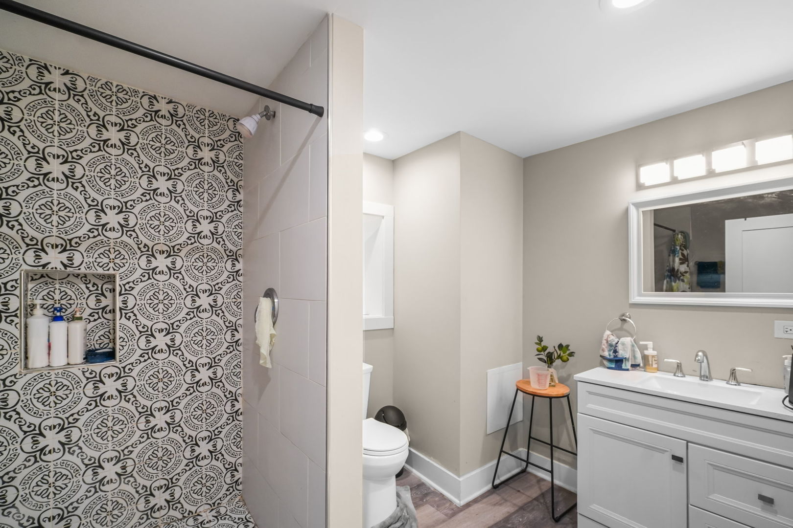 1906 South 60th Court Cicero, IL 60804 - Photo 21 of 40 a bathroom with a granite countertop sink toilet and shower