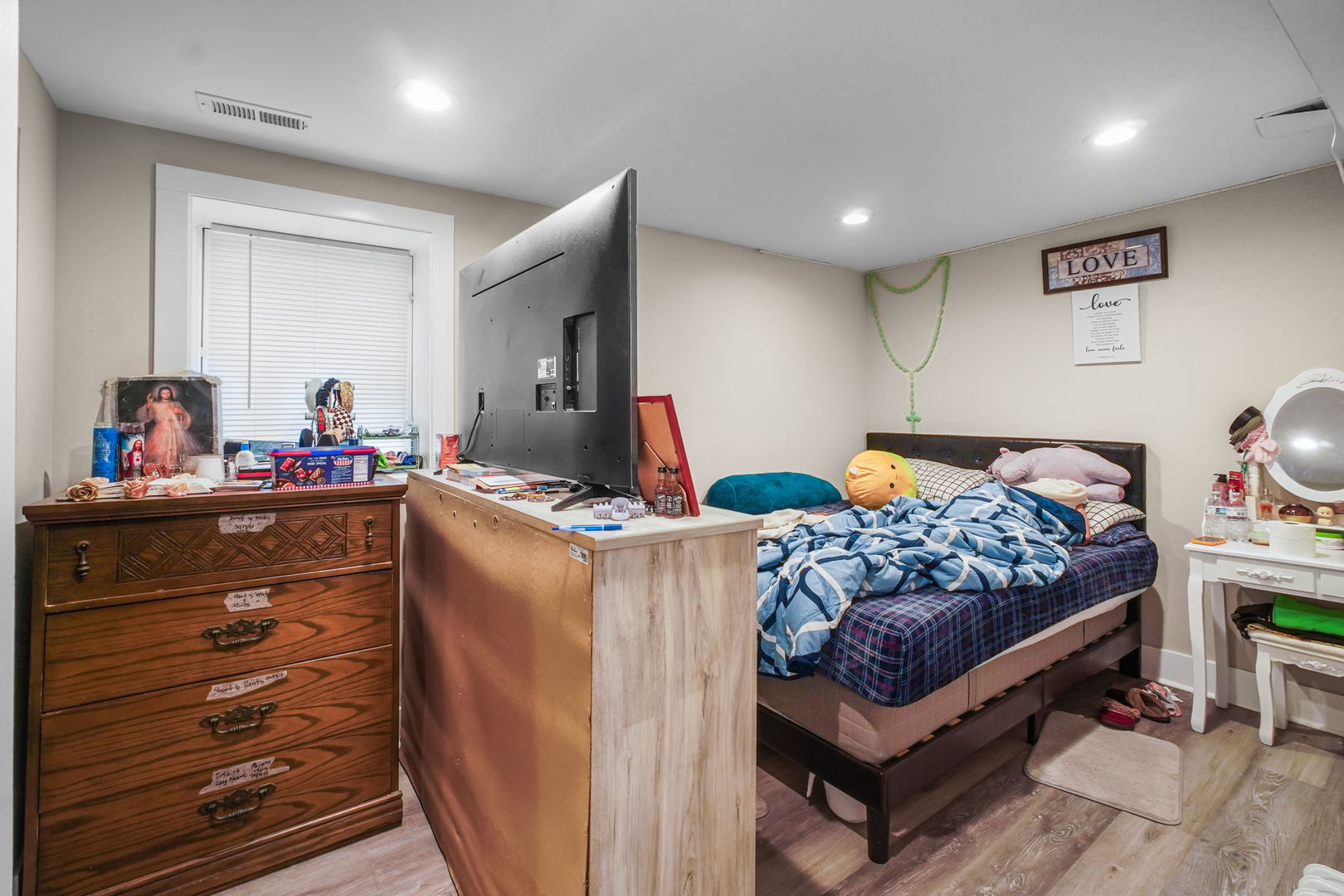 1906 South 60th Court Cicero, IL 60804 - Photo 24 of 40 a bedroom with furniture and a closet