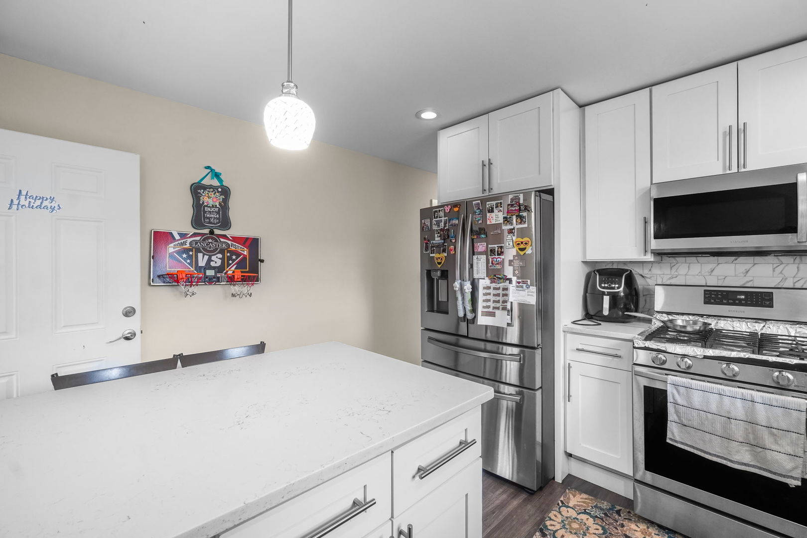 1906 South 60th Court Cicero, IL 60804 - Photo 29 of 40 a kitchen with stainless steel appliances a refrigerator sink and microwave