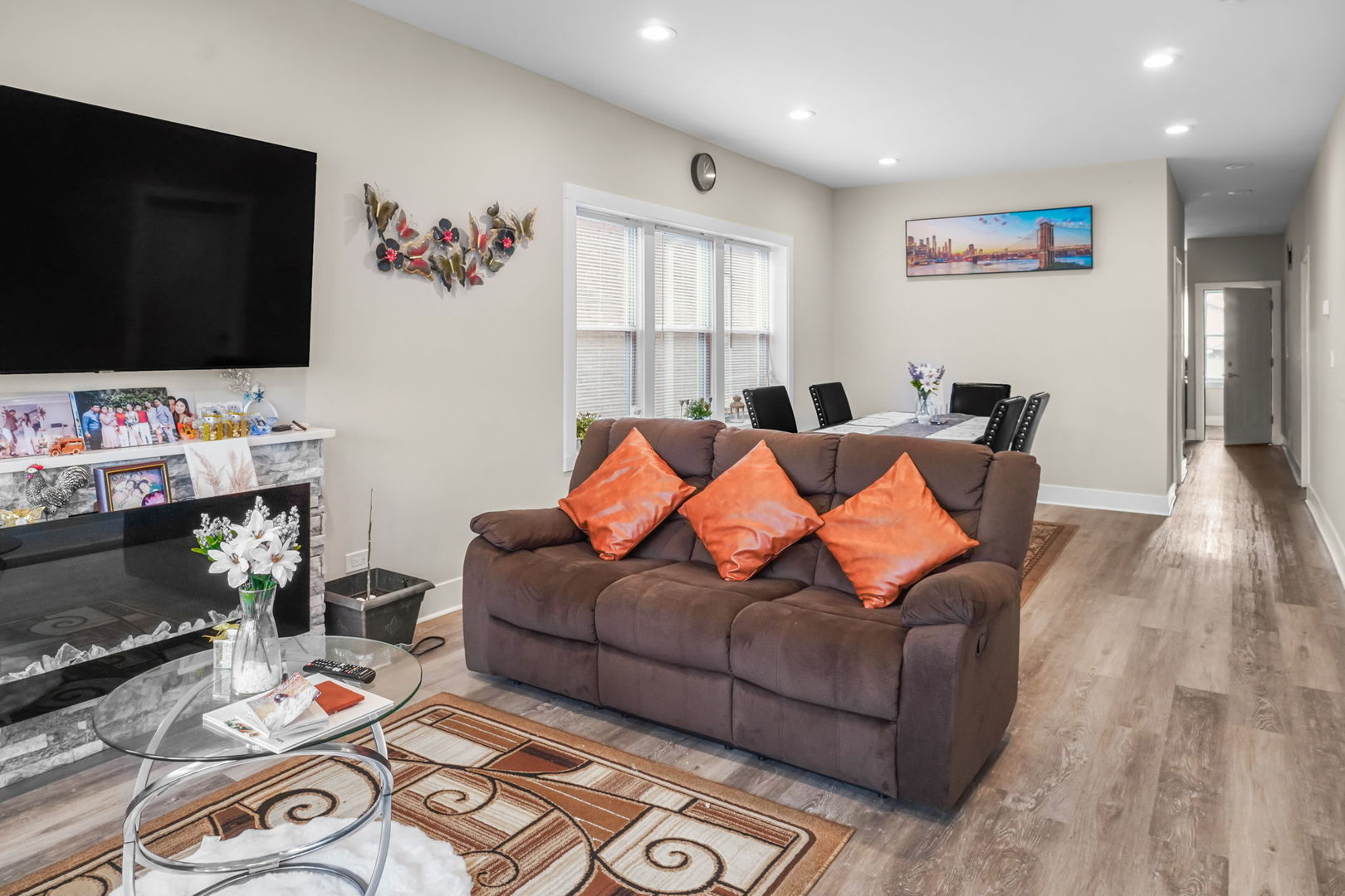 1906 South 60th Court Cicero, IL 60804 - Photo 8 of 40 a living room with furniture and a flat screen tv