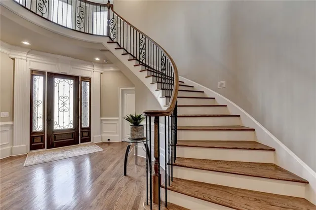 a view of living room with furniture and a ceiling fan