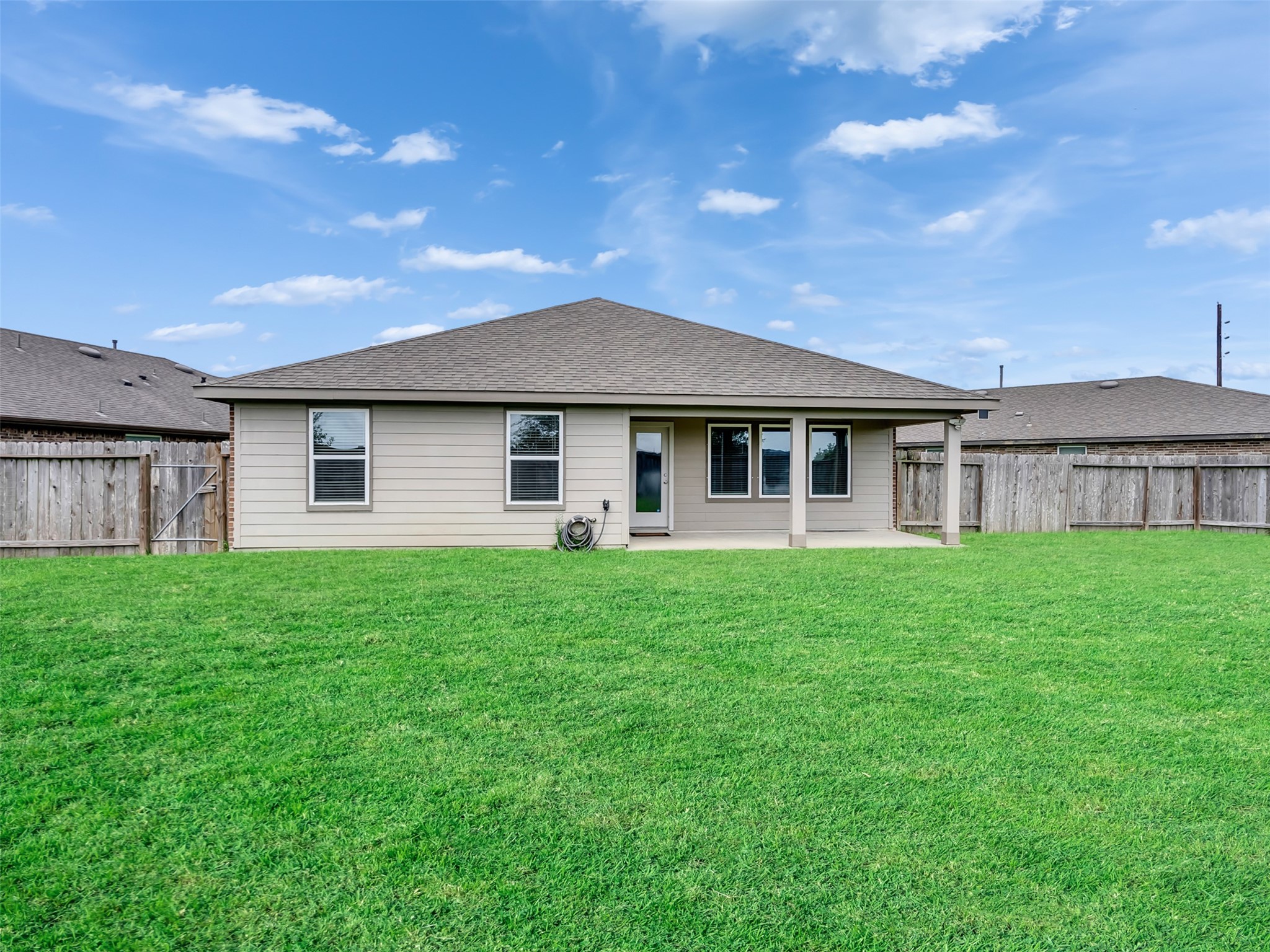 8003 Alcott Forest Lane Rosharon, TX 77583 - Photo 34 of 41 a view of a house with a backyard