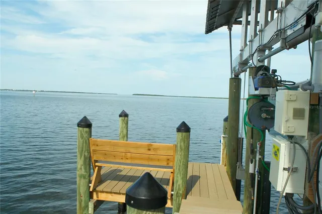 a view of a balcony with two chairs