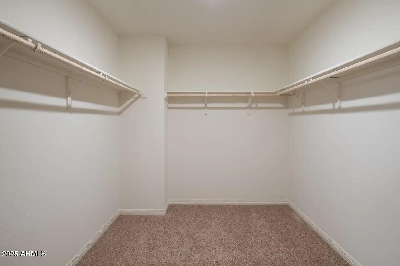 5825 West Ldg Drive Laveen, AZ 85339 - Photo 13 of 18 a view of an empty walk in closet