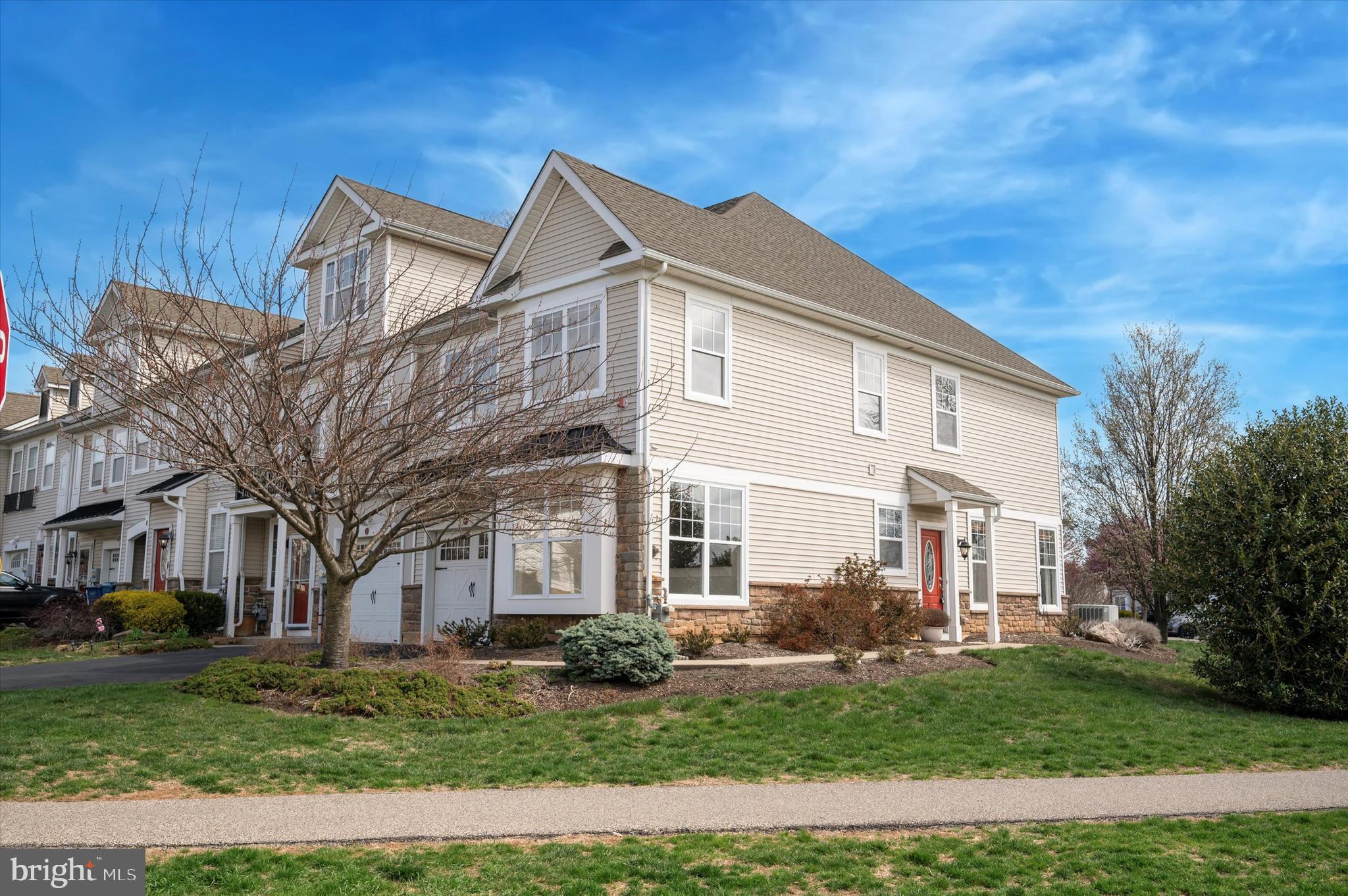 1 Old Cedarbrook Road Wyncote, PA 19095 - Photo 1 of 17 a view of a white house next to a yard with big trees