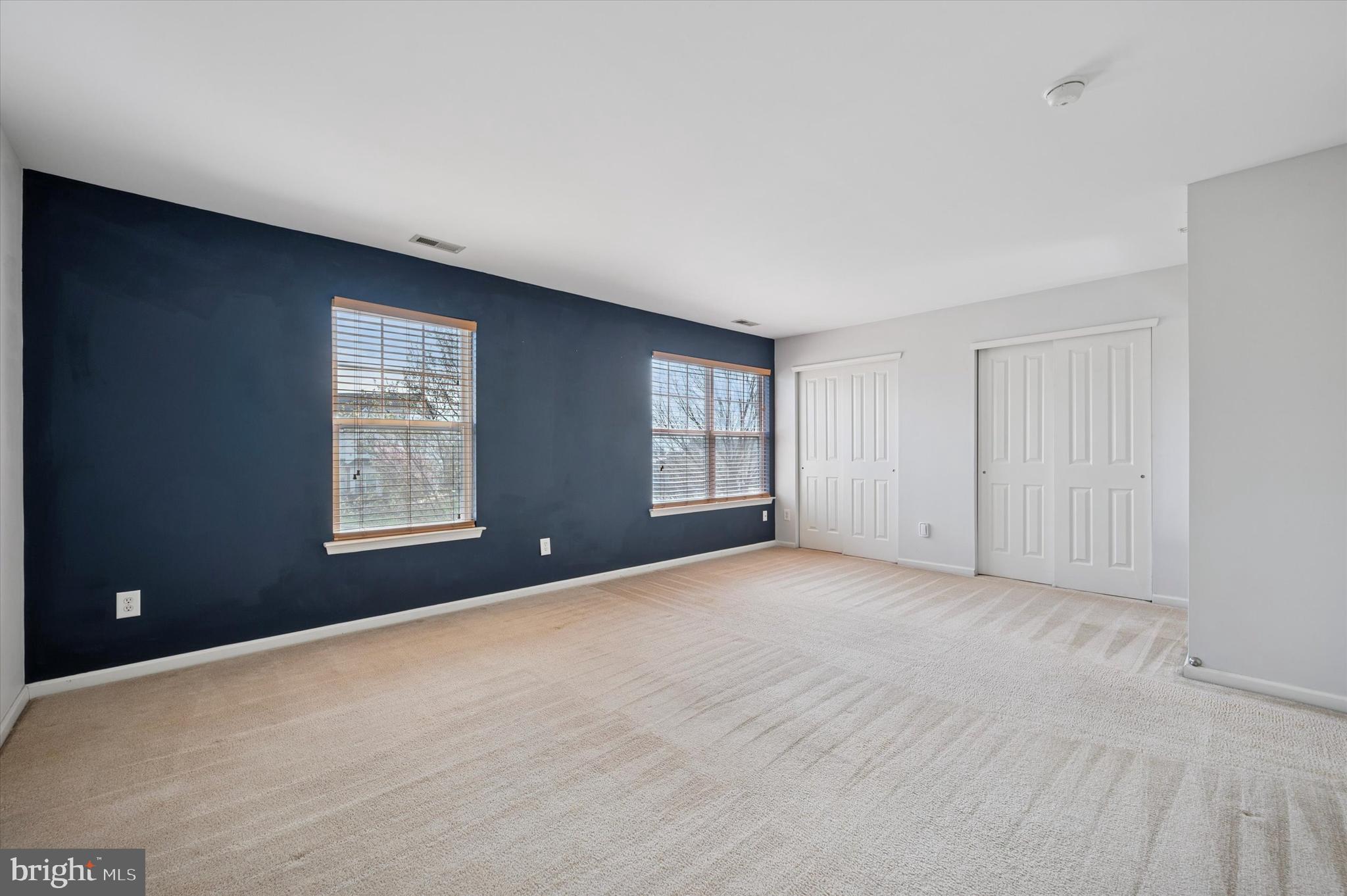 1 Old Cedarbrook Road Wyncote, PA 19095 - Photo 11 of 17 a view of an empty room with windows