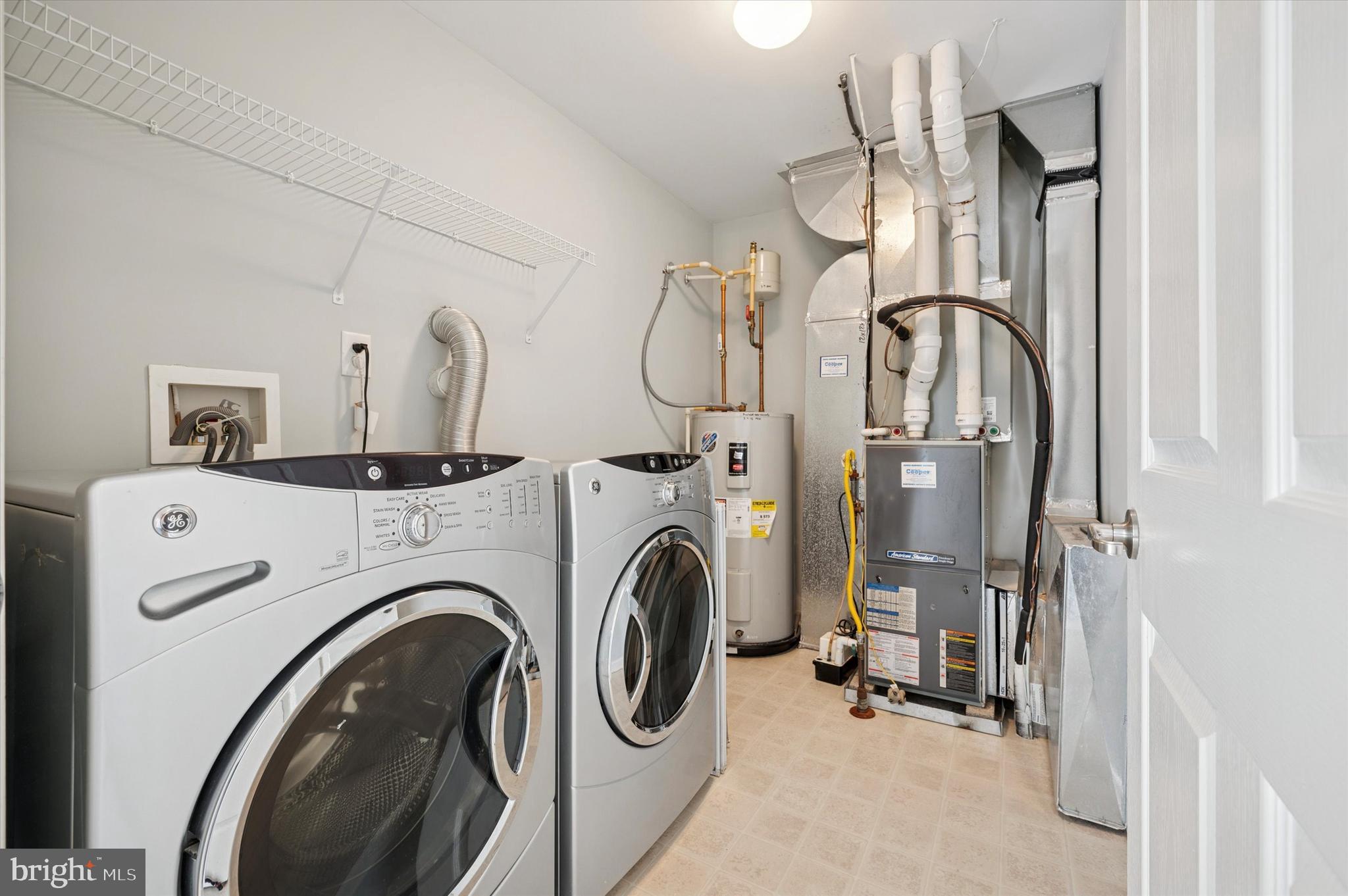 1 Old Cedarbrook Road Wyncote, PA 19095 - Photo 16 of 17 a utility room with dryer and washer
