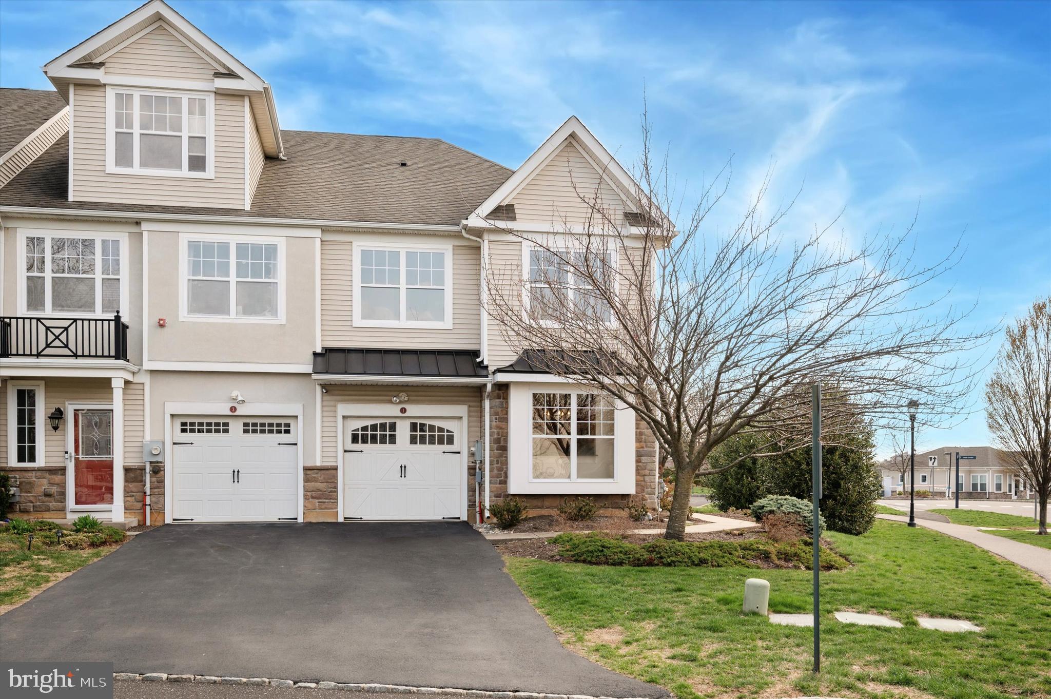 1 Old Cedarbrook Road Wyncote, PA 19095 - Photo 2 of 17 a front view of a house with a yard
