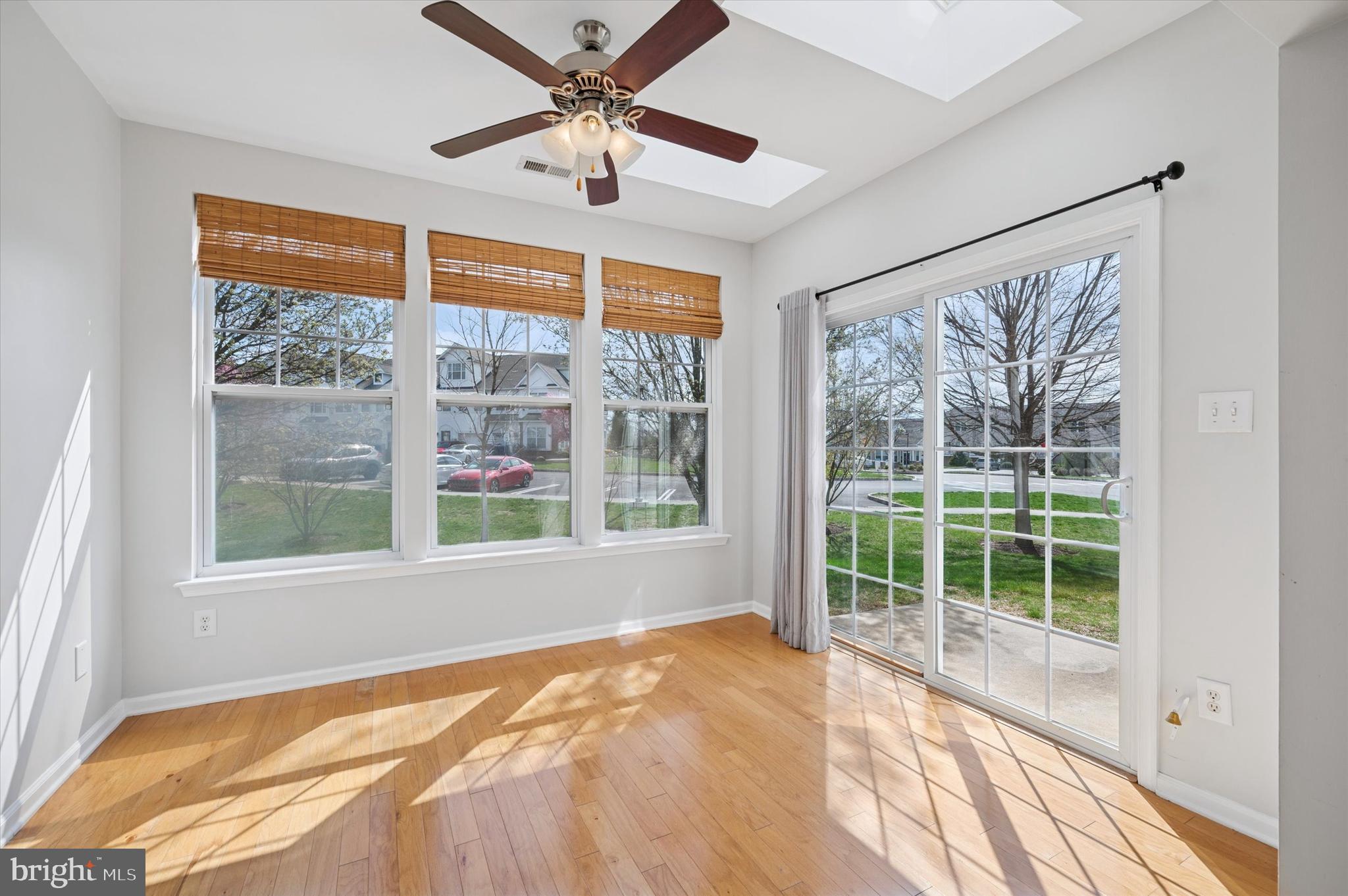 1 Old Cedarbrook Road Wyncote, PA 19095 - Photo 6 of 17 a view of a bedroom with wooden floor and a large window