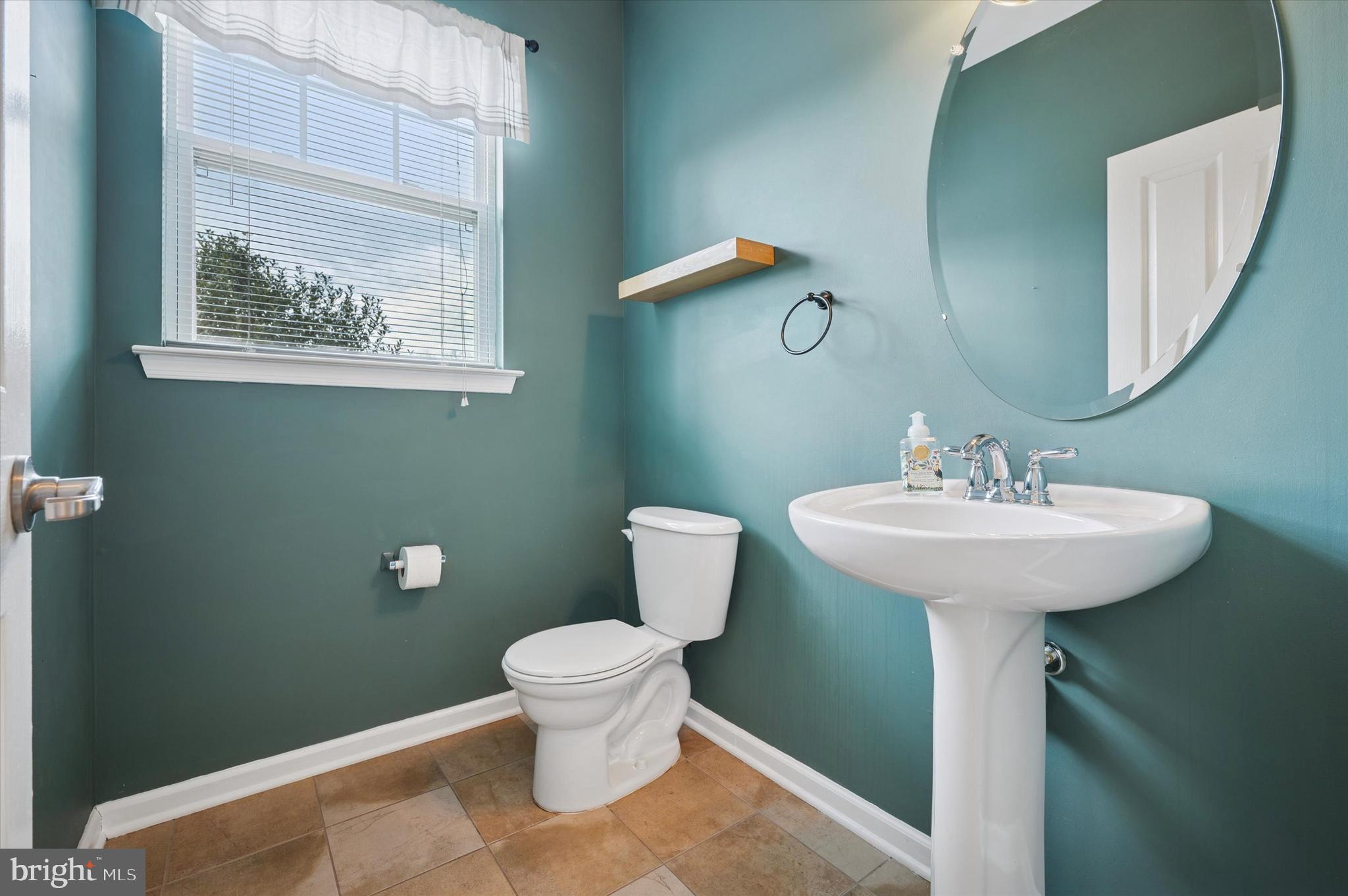 1 Old Cedarbrook Road Wyncote, PA 19095 - Photo 7 of 17 a bathroom with a toilet sink and mirror