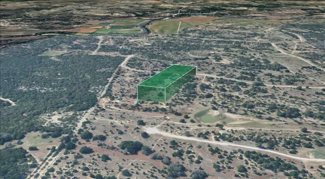 a view of a yard with water fountain