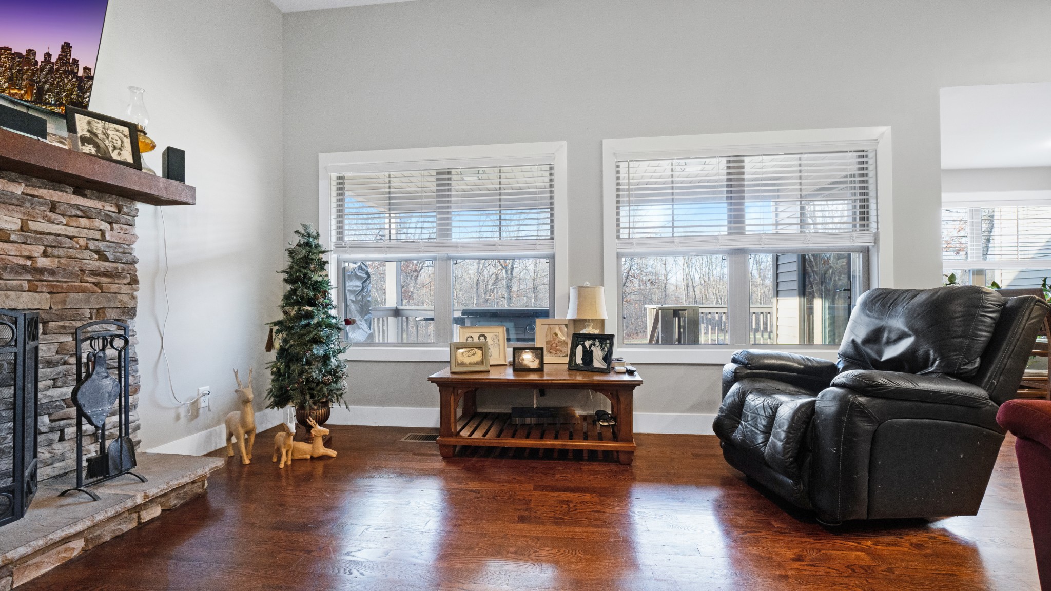 1743 Rapids Road Portland, TN 37148 - Photo 17 of 27 a living room with furniture and wooden floor