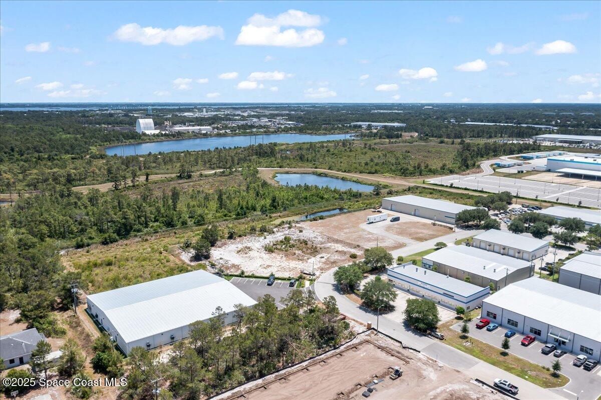 3041 Oxbow Circle Cocoa, FL 32926 - Photo 4 of 6 an aerial view of a house with a lake view