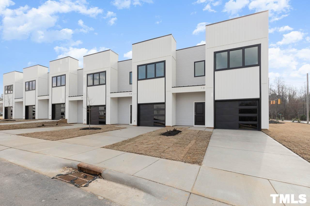4 South Laird Drive, Unit 7 Clayton, NC 27520 - Photo 4 of 26 a view of a building with a street