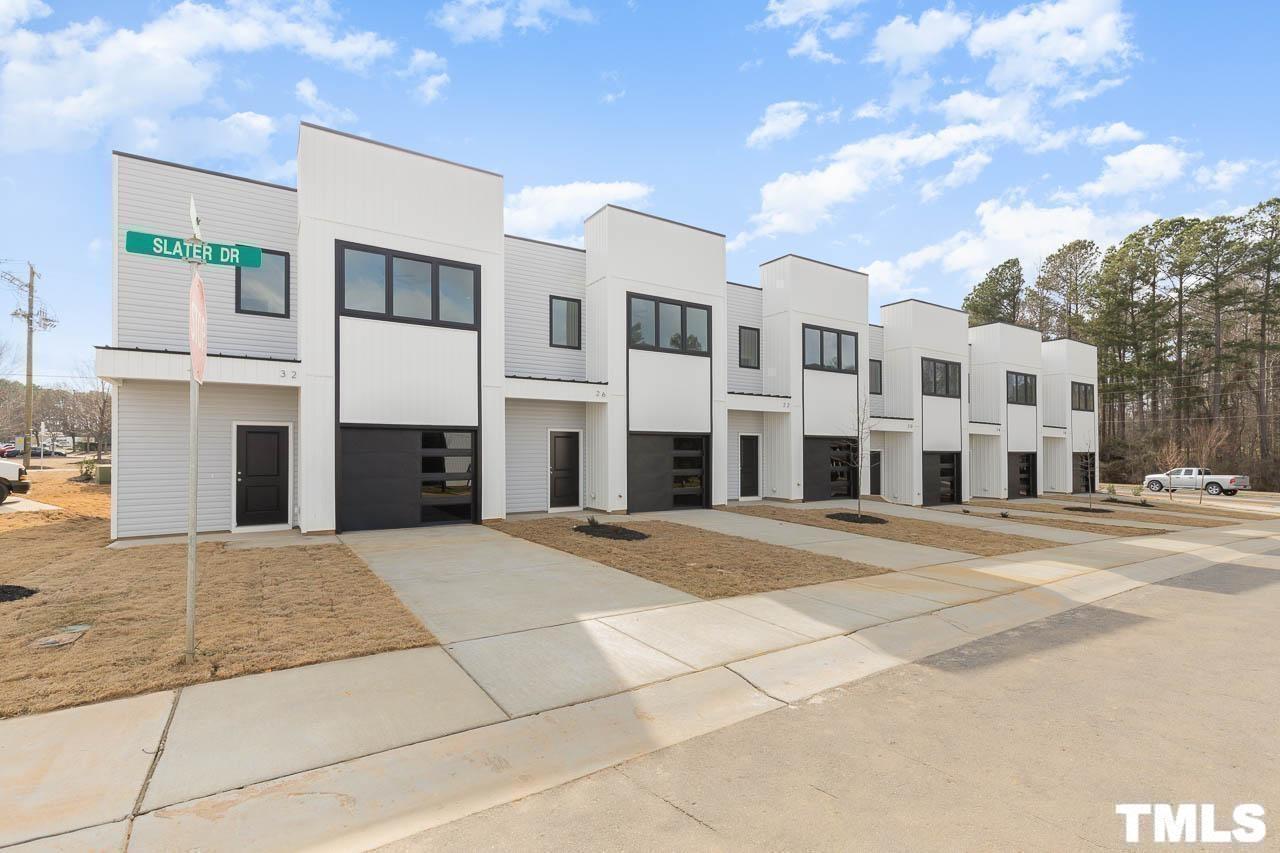 4 South Laird Drive, Unit 7 Clayton, NC 27520 - Photo 5 of 26 a view of a building with a street