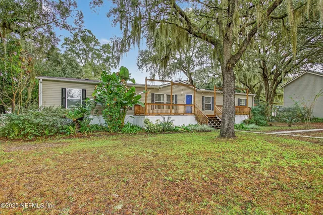 a house view with swimming pool