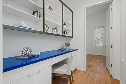 a view of entryway with wooden floor