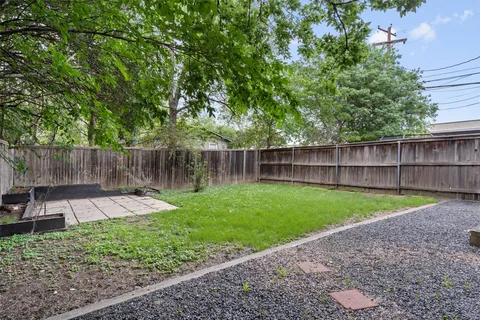 a view of a backyard with a slide