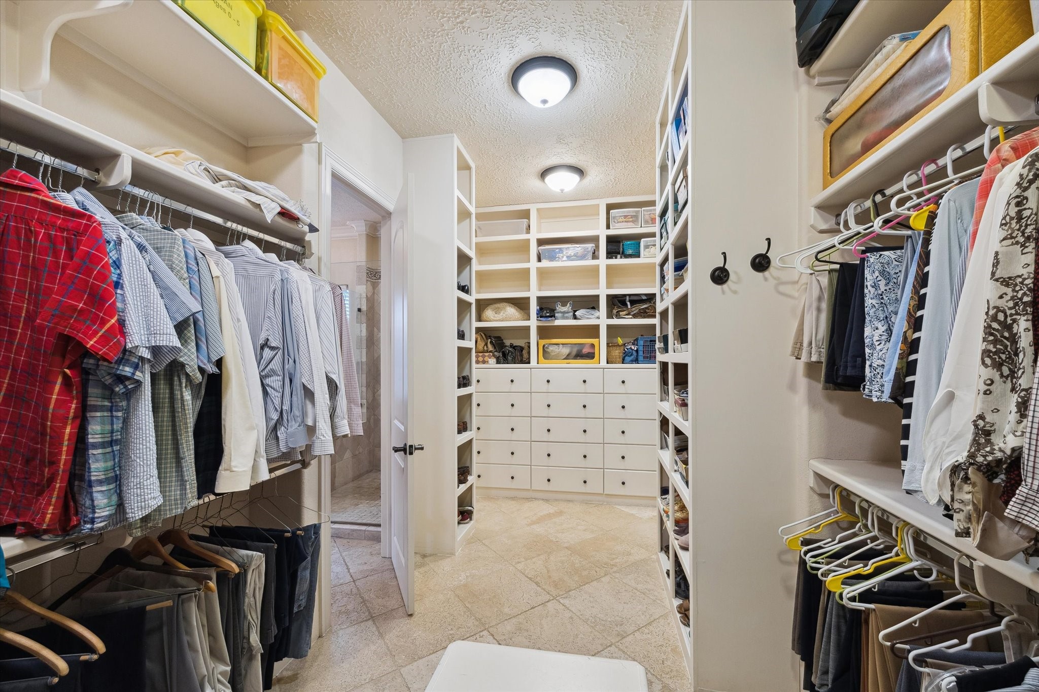 1406 Todville Road Seabrook, TX 77586 - Photo 39 of 49 INCREDIBLE WALK-IN CLOSET WITH EXTENSIVE CUSTOM BUILT-INS.