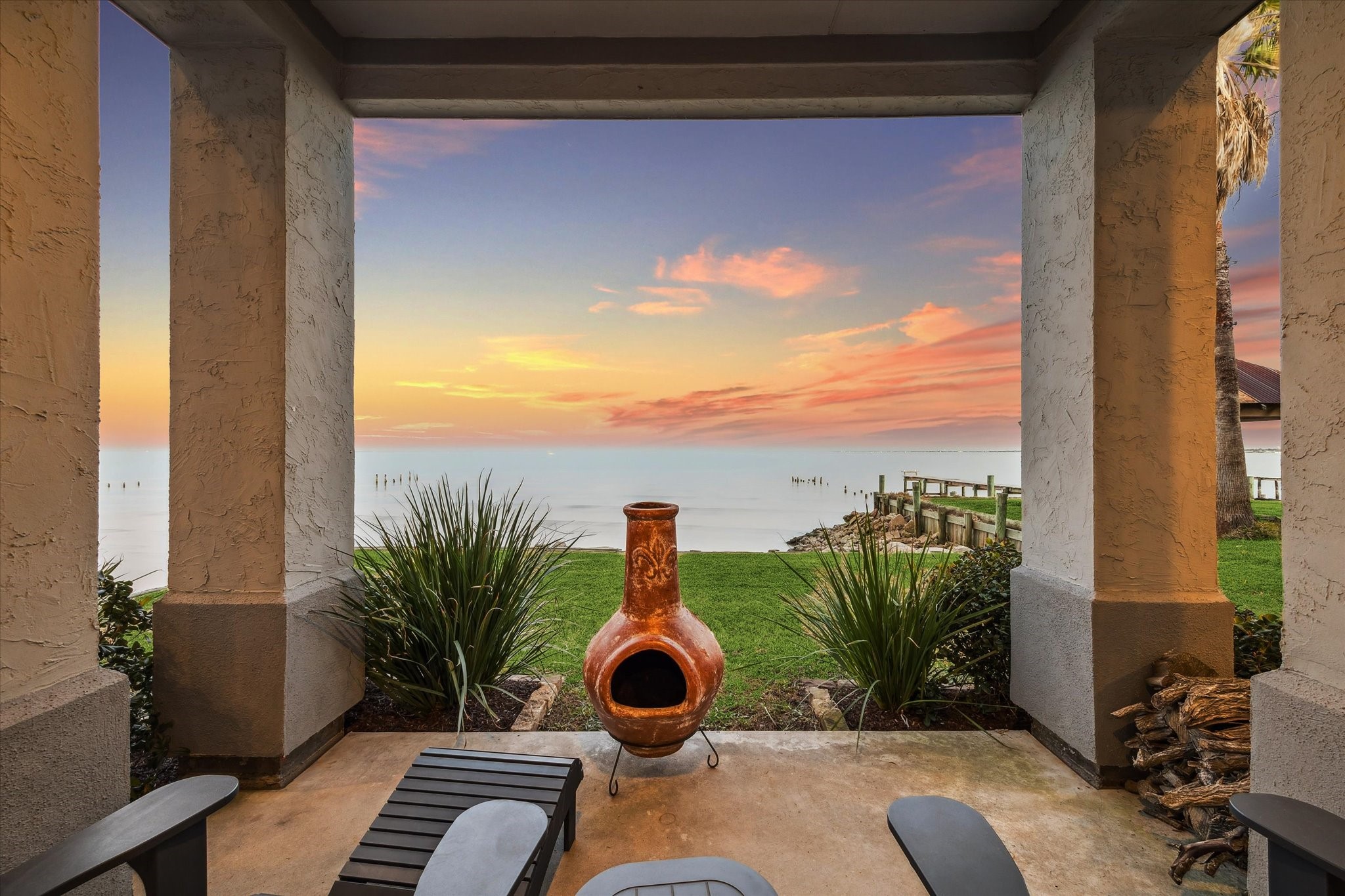 1406 Todville Road Seabrook, TX 77586 - Photo 47 of 49 THE EXTENSIVE COVERED PATIO IS GREAT AREA FOR A FIREPIT OR EVEN A HOT TUB.