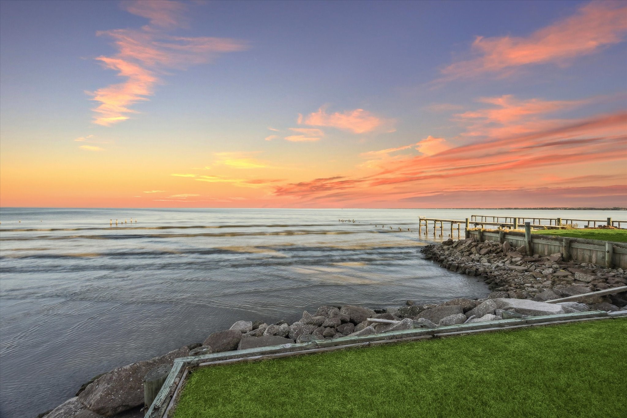 1406 Todville Road Seabrook, TX 77586 - Photo 5 of 49 ENJOY BREATHTAKING SUNRISES, BEAUTIFUL SUNSETS AND THE SOUND OF CRASHING WAVES FROM YOUR BACKDOOR.
