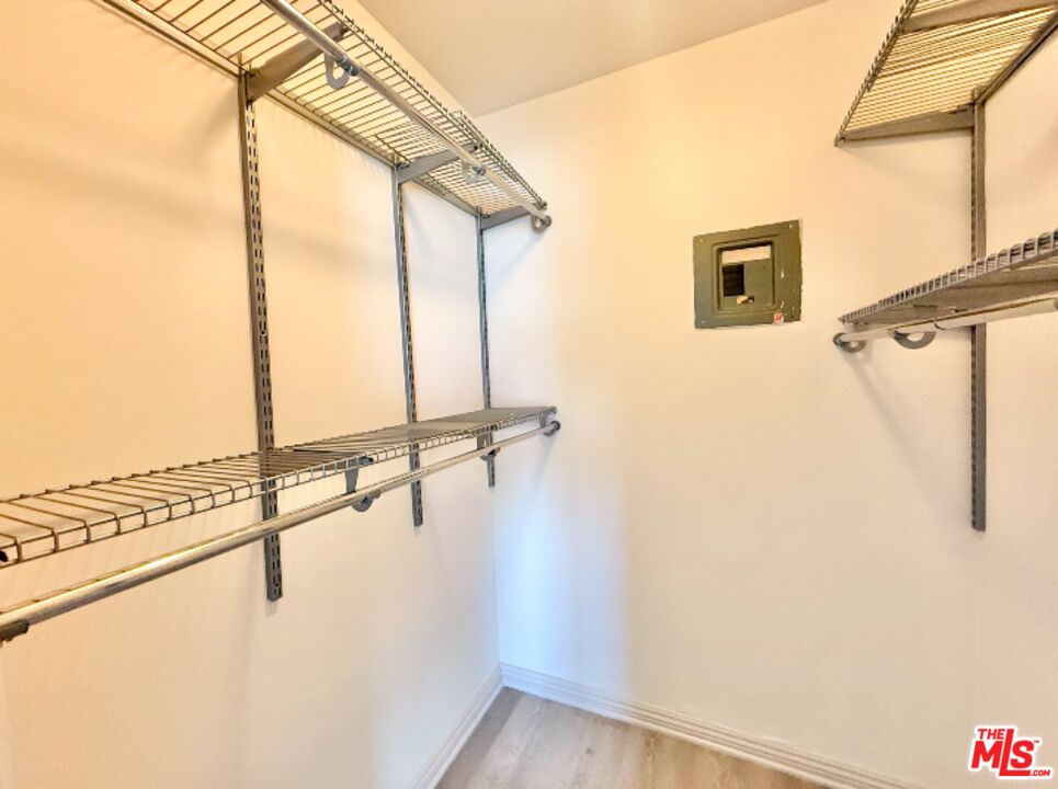 821 3rd Street, Unit 305 Santa Monica, CA 90403 - Photo 10 of 13 a view of a hallway with a glass door