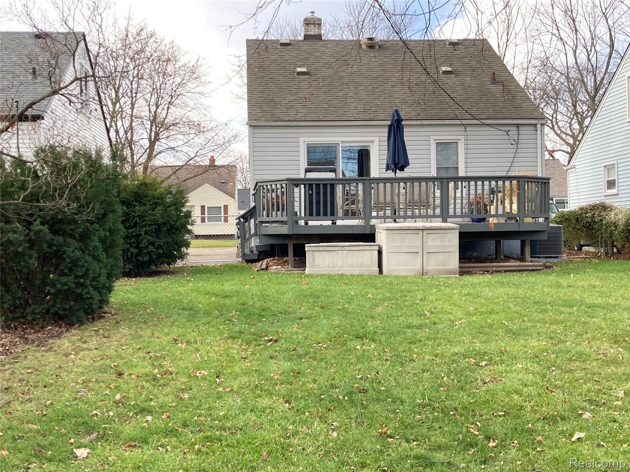 View of deck and yard