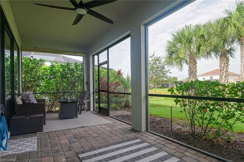 2137 Clementine Street Naples, FL 34120 - Photo 25 of 32 a garden view with a seating space