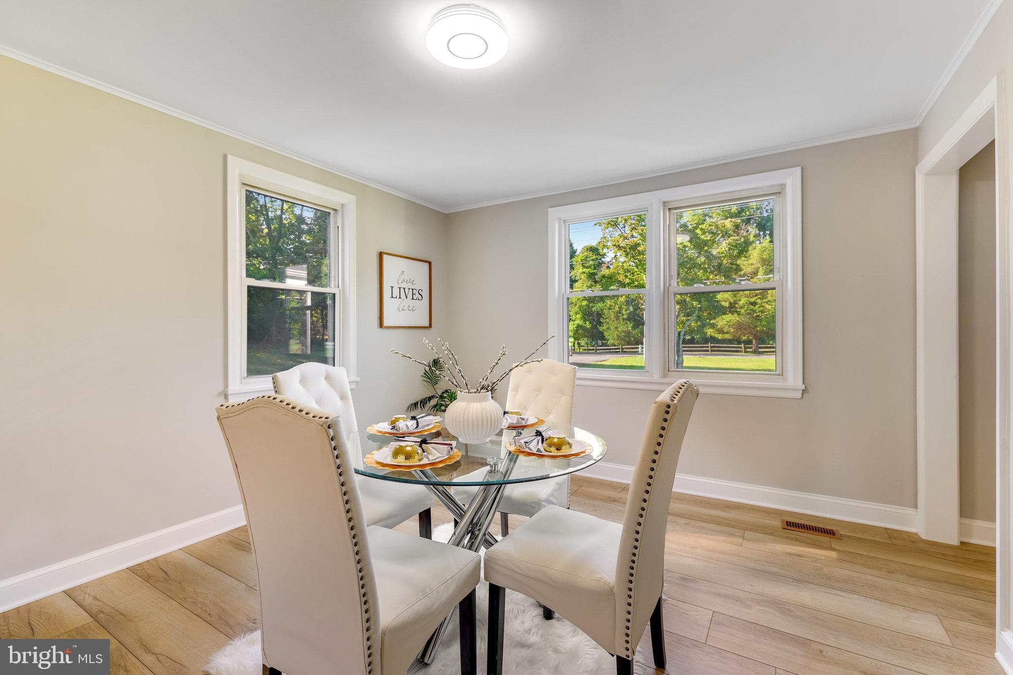 11410 Waples Mill Road Oakton, VA 22124 - Photo 13 of 62 Bright dining space with serene views.