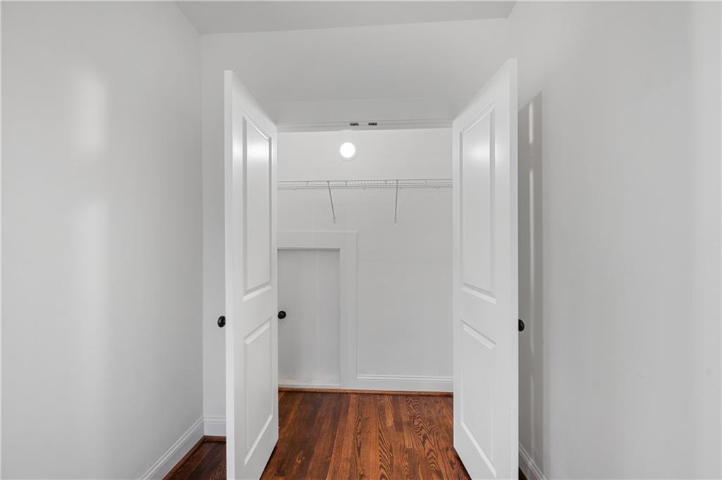 405 4th Street Northeast, Unit 24 Atlanta, GA 30308 - Photo 15 of 19 a view of a hallway with wooden floor