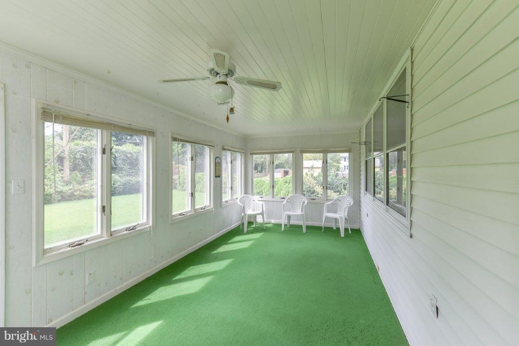 206 Friendship Road Elkton, MD 21921 - Photo 27 of 30 Sun Porch is Complete with Doggie Door