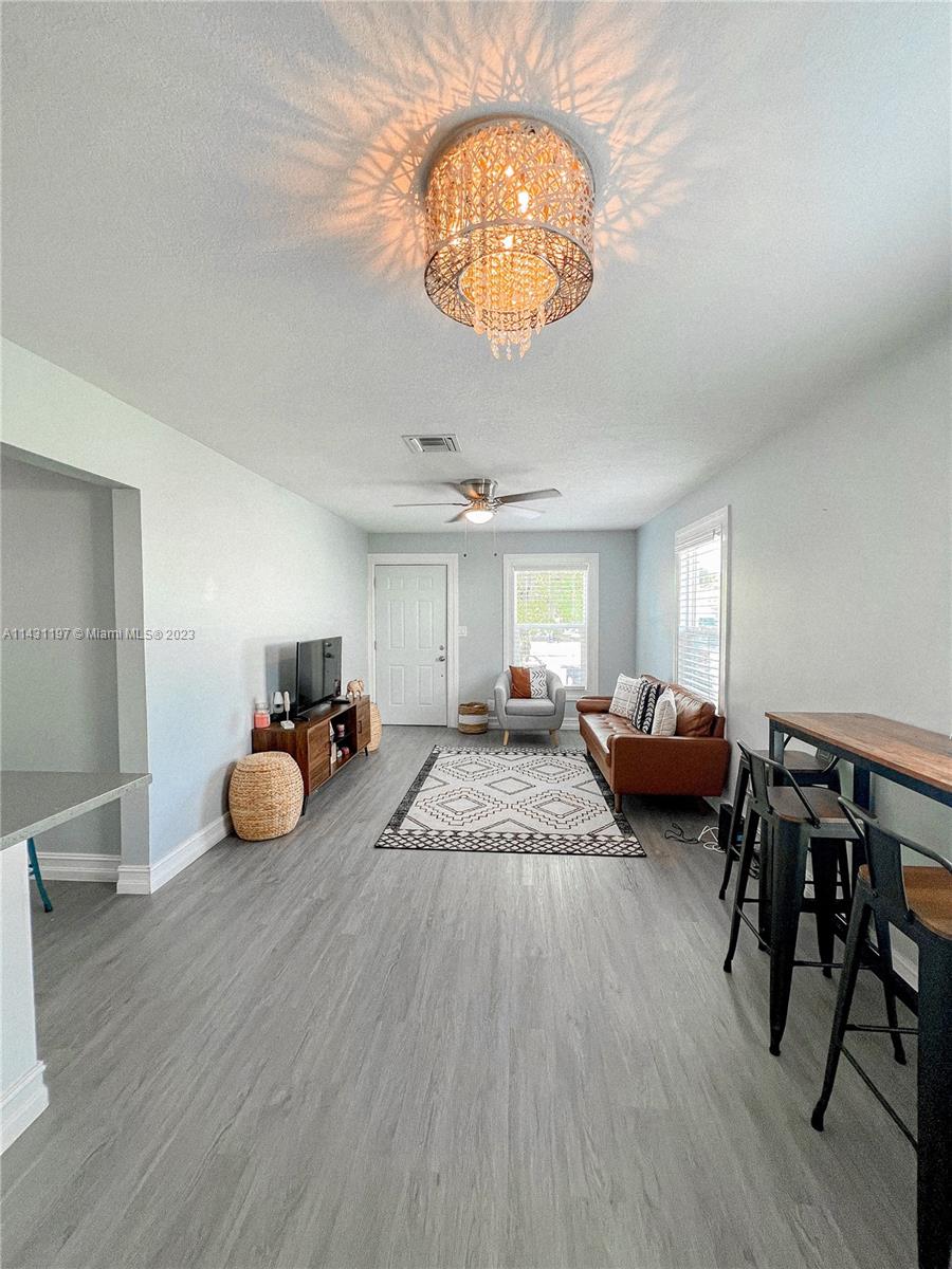 515 Valley Forge Road West Palm Beach, FL 33405 - Photo 5 of 9 a view of a livingroom and dining room