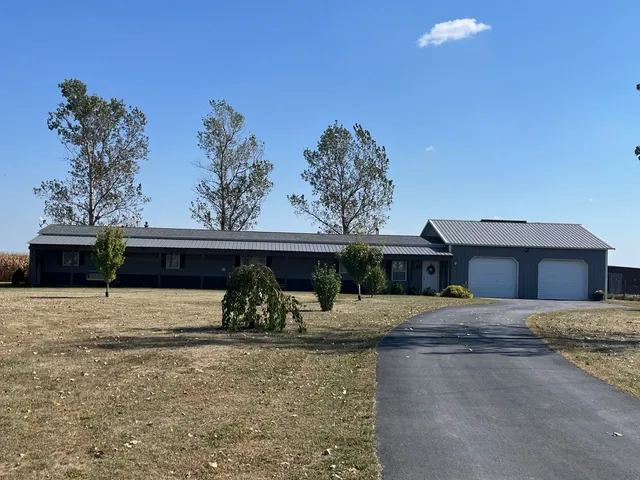 a front view of a house with patio
