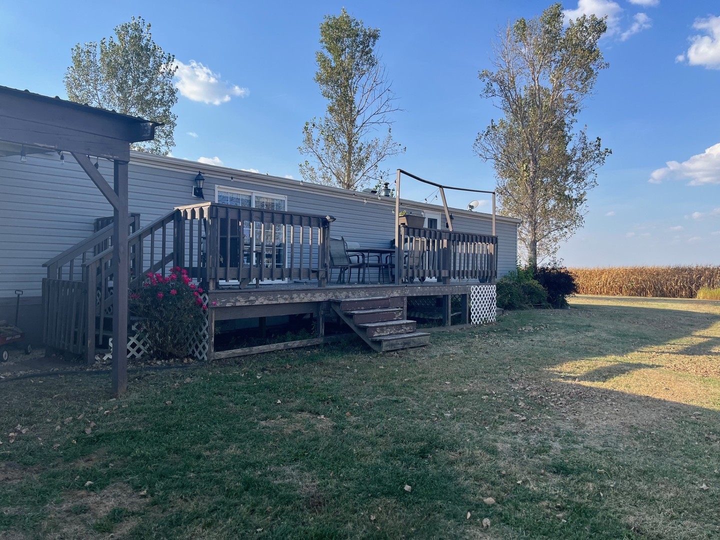 3770 East 1050th Road Earlville, IL 60518 - Photo 2 of 11 a view of a backyard with wooden fence