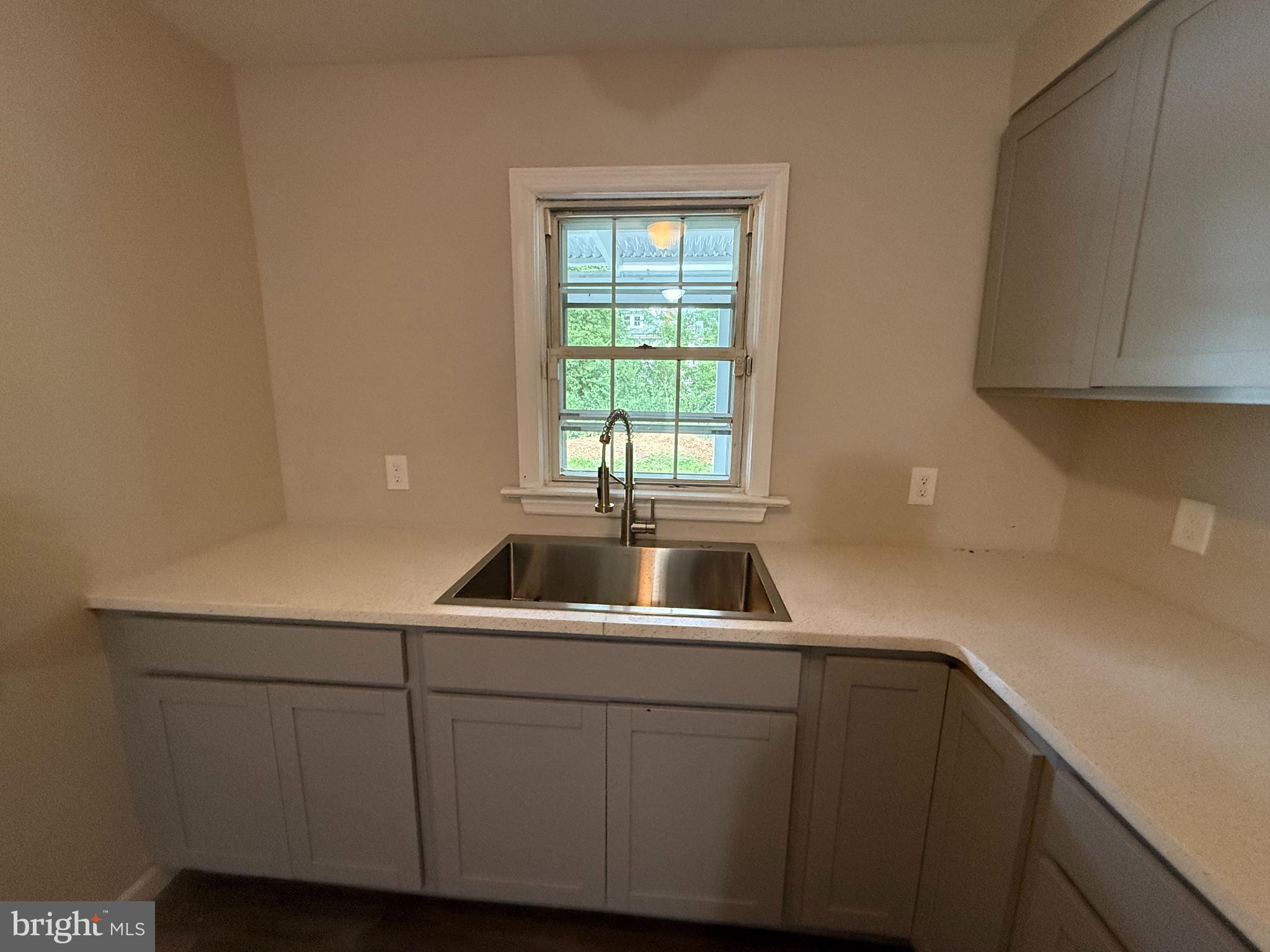 17 Wayne Road Bridgeton, NJ 08302 - Photo 28 of 49 a kitchen with a sink and cabinets