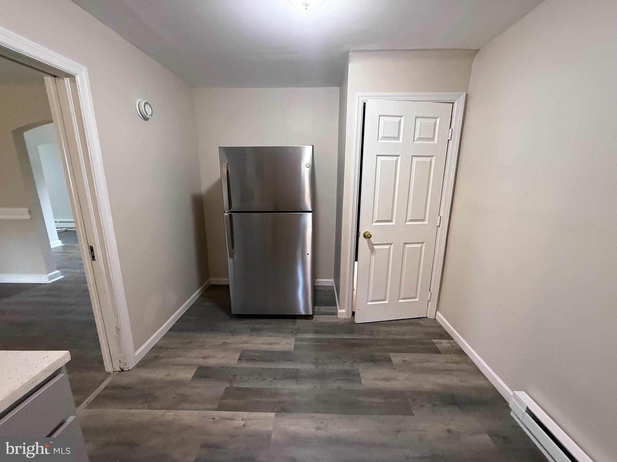 17 Wayne Road Bridgeton, NJ 08302 - Photo 29 of 49 a view of empty room with wooden floor