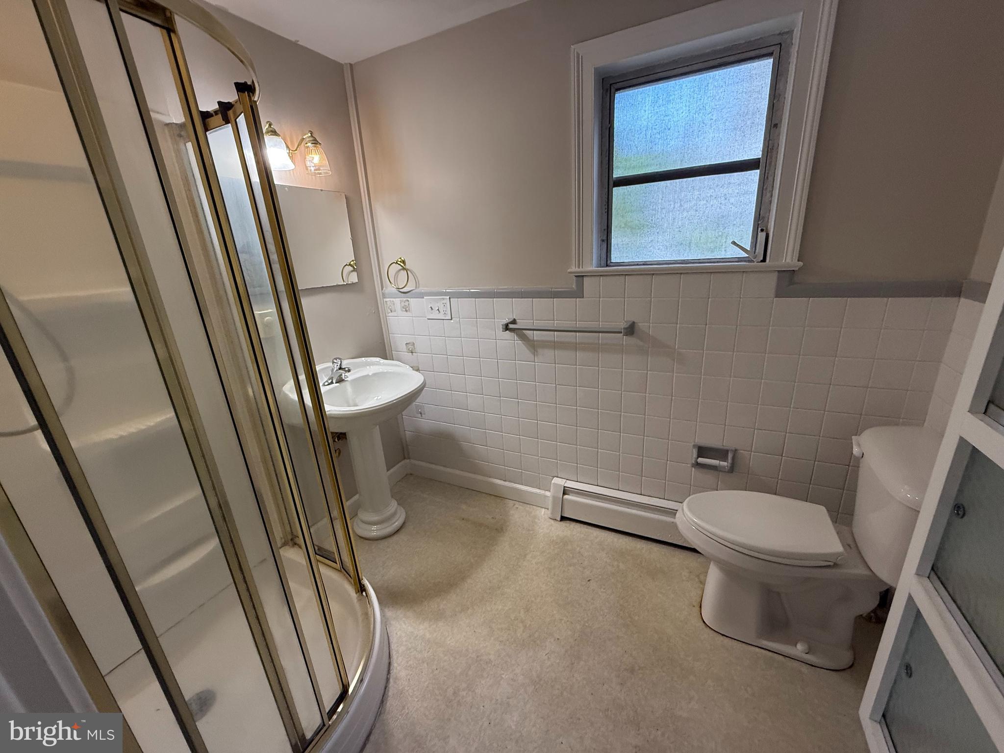 17 Wayne Road Bridgeton, NJ 08302 - Photo 30 of 49 a bathroom with a toilet and a shower