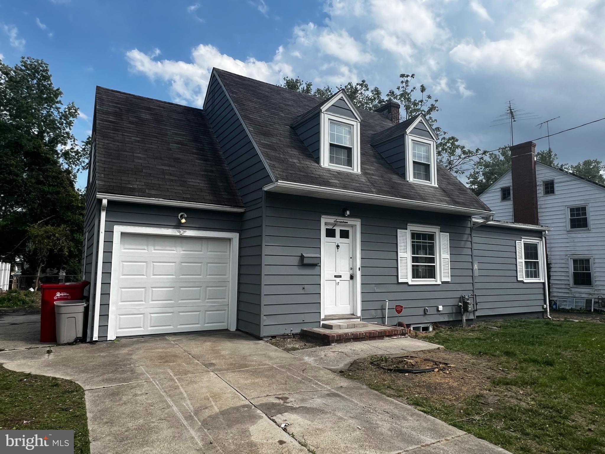 17 Wayne Road Bridgeton, NJ 08302 - Photo 3 of 49 a view of a house with a yard and garage